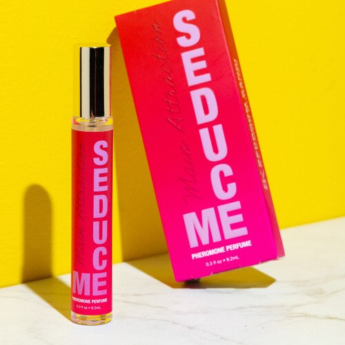Bedroom Kandi pheromone perfume on a bold color background